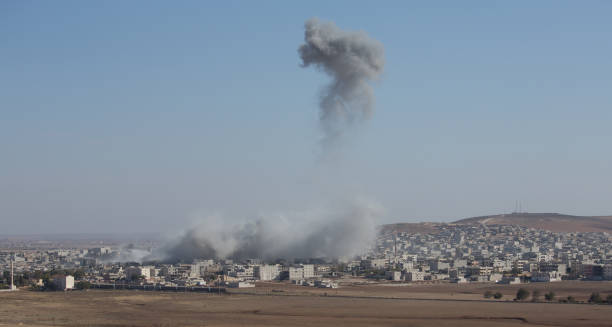 Air strikes Bomb in Kobane in Syria air attack stock pictures, royalty-free photos & images