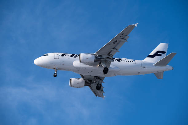 Airbus a319 , operated by the Finnish flag carrier Finnair, on final approach at Helsinki-Vantaa airport stock photo