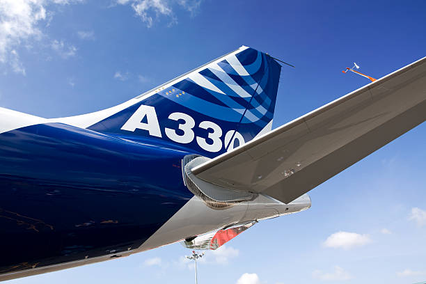 Airbus A330 airplane tail upward view stock photo