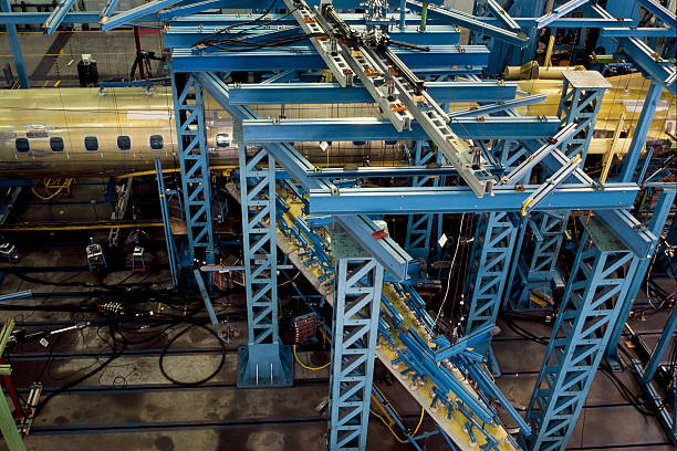 Aircraft under construction in aerospace workshop stock photo