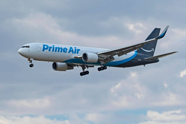 Airplane Amazon Prime Air freight jet landing at Ontario International Airport stock photo