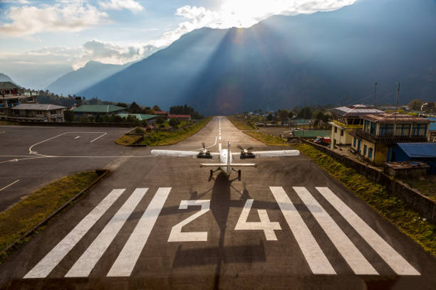 Airplane before taking off at Runway of small Airport Himalaya stock photo