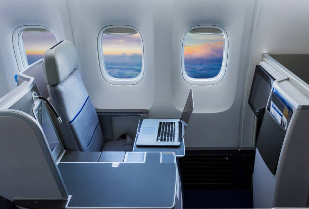 airplane cabin interior passenger airplane cabin interior airplane seat stock pictures, royalty-free photos & images