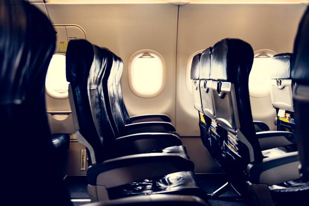 Airplane interior Airplane interior plane window seat stock pictures, royalty-free photos & images