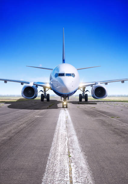 airplane airplane on the runway ready for take off airport runway stock pictures, royalty-free photos & images