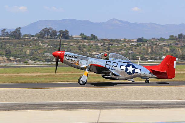 Airplane WWII P-51 Mustang on runway stock photo
