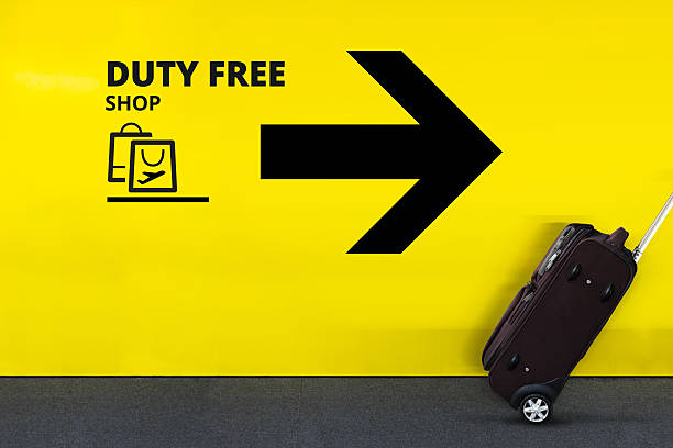 Airport Sign With Shopping Bag Icon, Arrow and moving Luggage stock photo