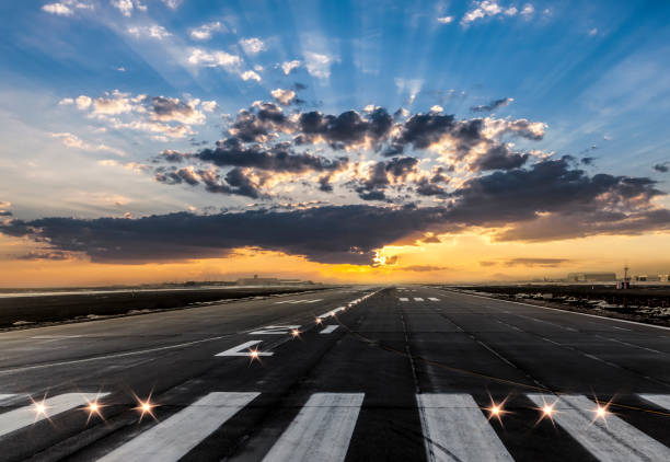 Airport takeoff and landing area at evening Airport takeoff and landing area at evening airport runway stock pictures, royalty-free photos & images