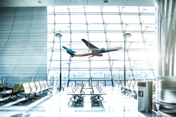 airport waiting lounge and airplane take off and landing - airport lounge imagens e fotografias de stock