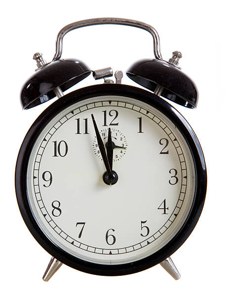Alarm clock on white background stock photo