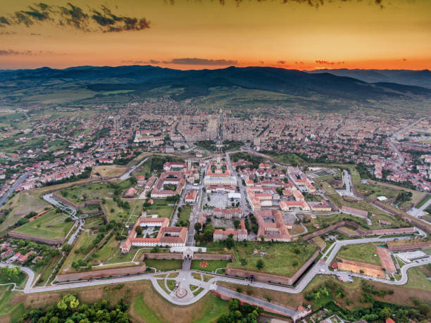Alba Iulia medieval fortress aerial view at sunset stock photo