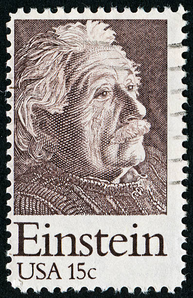 Albert Einstein Stamp "Richmond, Virginia, USA - February 27th, 2012: Cancelled 15 Cents United States Of America Stamp Commemorating Albert Einstein. Einstein Was A Theoretical Physicist Known Best For His Theory Of Relativity." albert einstein stock pictures, royalty-free photos & images
