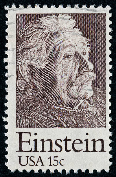 Albert Einstein Stamp "Richmond, Virginia, USA - May 21st, 2012: Cancelled 15 Cents United States Of America Stamp Commemorating Albert Einstein. Einstein Was A Theoretical Physicist Known Best For His Theory Of Relativity." albert einstein stock pictures, royalty-free photos & images