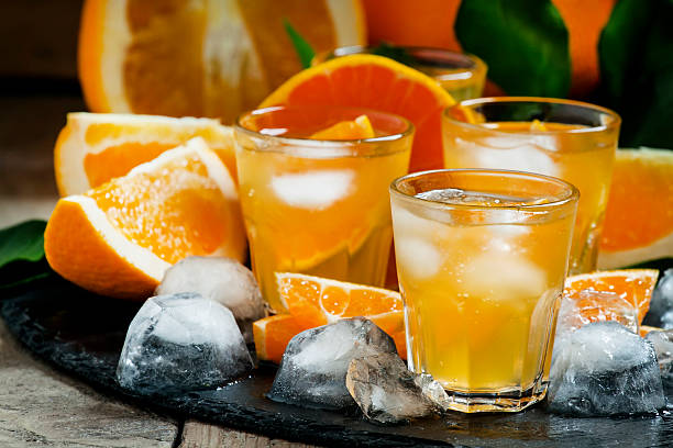 Alcoholic cocktail of orange juice, ice and soda Alcoholic cocktail of orange juice, ice and soda, selective focus screwdriver drink stock pictures, royalty-free photos & images