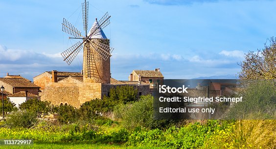 istock Algadia, Mallorca, Spain, December 17, 2018 An old windmill in the city 1133729917