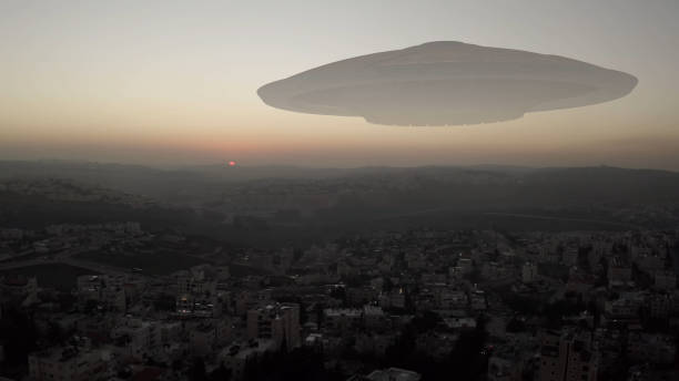 Alien Spaceship ufo hovering over city at sunset - aerial view , drone view over Jerusalem city in Israel with visual effect element, invasion sci fi concept alien photos stock pictures, royalty-free photos & images