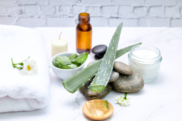 Aloe Vera extract for spa skin treatment Aloe Vera extract for spa skin treatment. Care and health concept aloe vera mask stock pictures, royalty-free photos & images