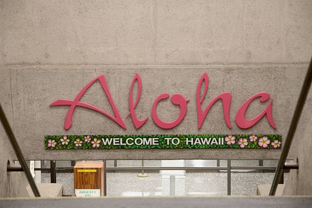 “Aloha, Welcome to Hawaii” sign at the arrival area of Honolulu International Airport stock photo