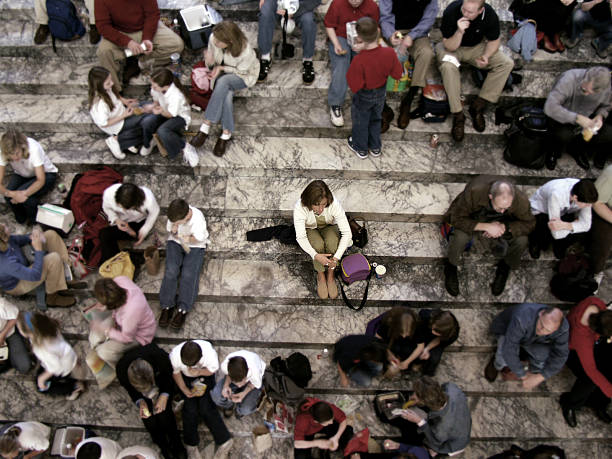 Alone in a Crowd  prejudice stock pictures, royalty-free photos & images