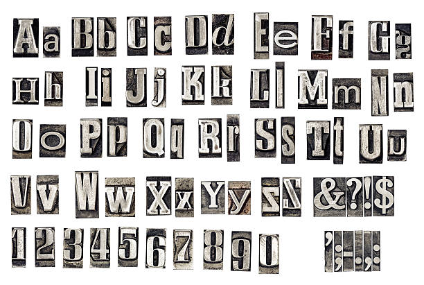alphabet from old metal letters stock photo