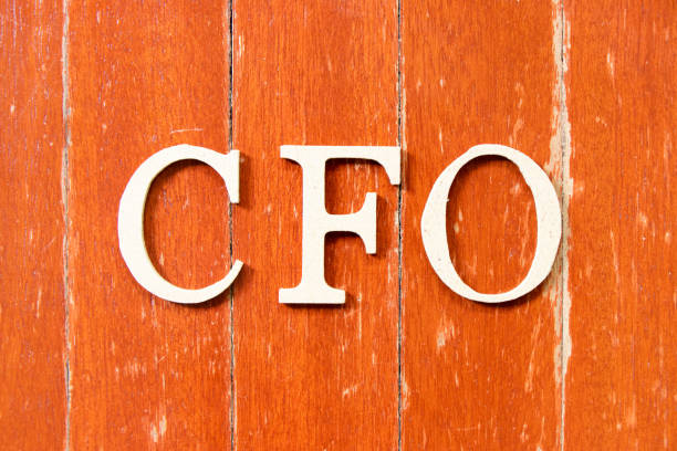 Alphabet letter in word CFO (Abbreviation of Chief Financial Officer) on old red color wood plate background Alphabet letter in word CFO (Abbreviation of Chief Financial Officer) on old red color wood plate background cfo stock pictures, royalty-free photos & images