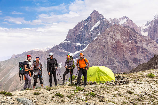 Alpine climbers team and camp stock photo