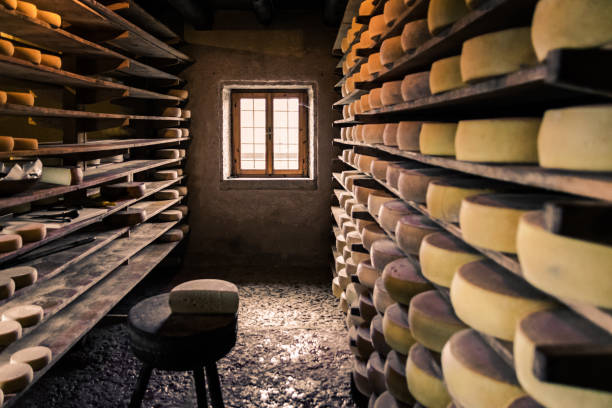 Alpine hut that produces  homemade cheeses. Alpine hut that produces and sells homemade cheeses. artisanal food and drink stock pictures, royalty-free photos & images