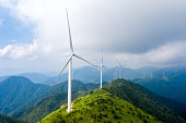 istock Alpine meadows and wind power 1329195248