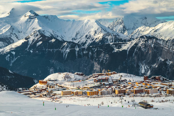 Alpine ski resort with buildings and picturesque scenery, France stock photo