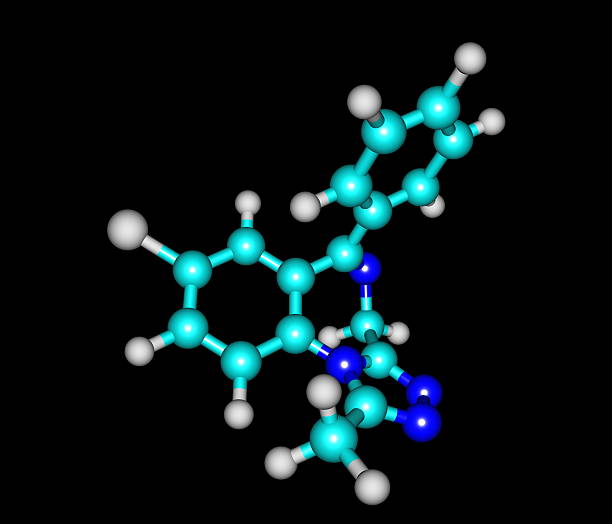 Alprazolam molecule isolated on black Alprazolam (Xanax), available under other generic names, is a short-acting anxiolytic of the benzodiazepine class of psychoactive drugs. xanax pill stock pictures, royalty-free photos & images