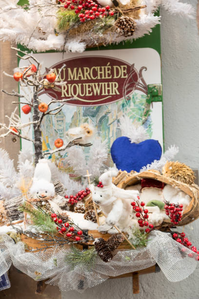 RIQUEWIHR, FRANCE. DECEMBER 29 2018: Alsace, France. RIQUEWIHR, FRANCE. DECEMBER 29 2018: Colorful decorations on the Christmas market in Alsace, France. riquewihr stock pictures, royalty-free photos & images