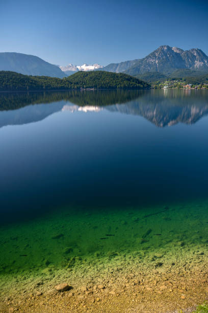Altaussee with Dachstein Glacier, Styria, Austria Panorama of the beautiful lake Altaussee with the famous Dachstein Glacier in back. Nature Reserve with Drinking Water Quality. Austrian Alps Panorama. Nikon D850. Converted from RAW. ausseerland stock pictures, royalty-free photos & images