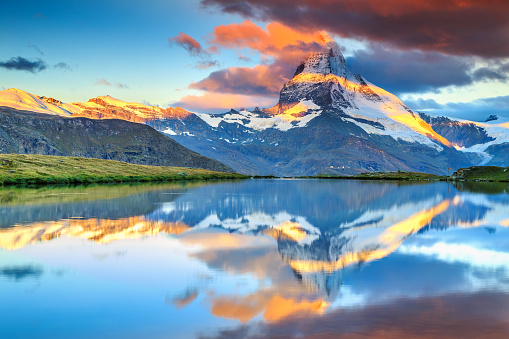 Magical sunrise panorama with Matterhorn and beautiful alpine lake,Stellisee,Valais region,Switzerland,Europe