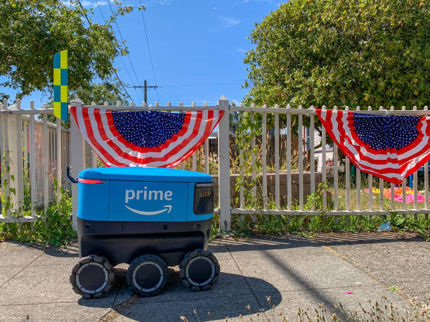 Amazon Prime Home Delivery Robot Navigating Sidewalk stock photo