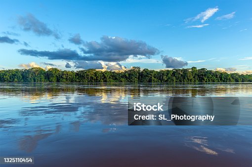 istock Amazon River Sunset Reflection, Peru 1325110454