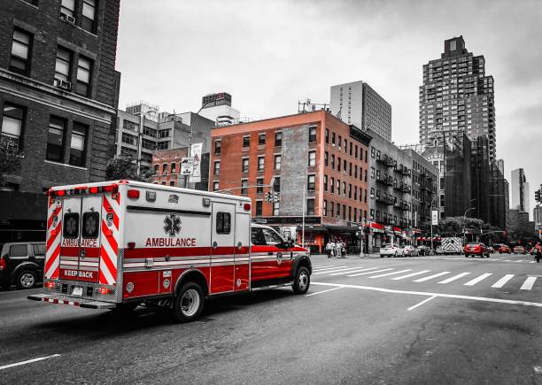 Ambulance in Harlem Ambulance on the streets of New York City ambulance stock pictures, royalty-free photos & images