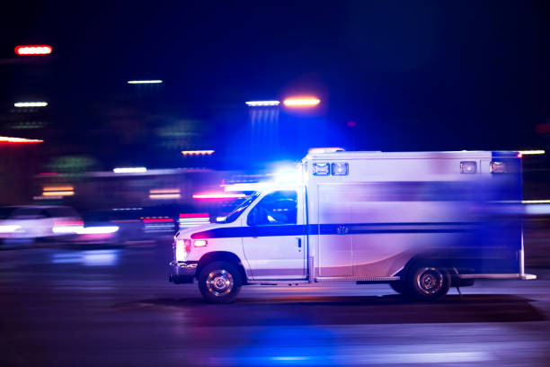 Ambulance An ambulance responds to the scene of an emergency. ambulance stock pictures, royalty-free photos & images