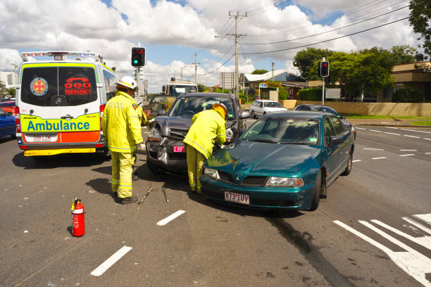 Ambulance, Rescue and crashed cars at a vehicle accident stock photo