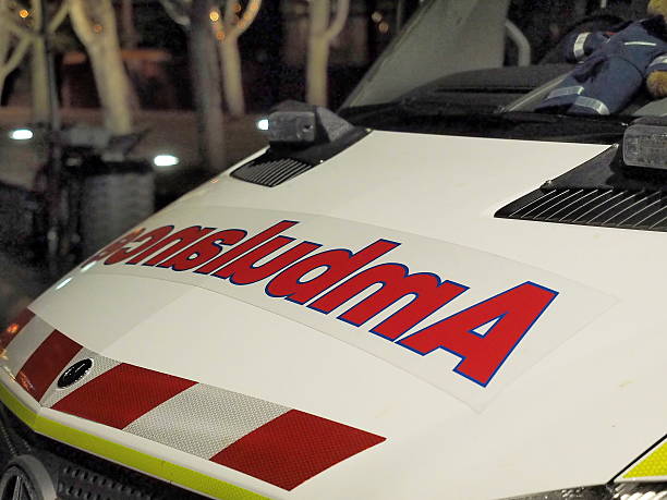Ambulance vehicle front at a late night emergency stock photo