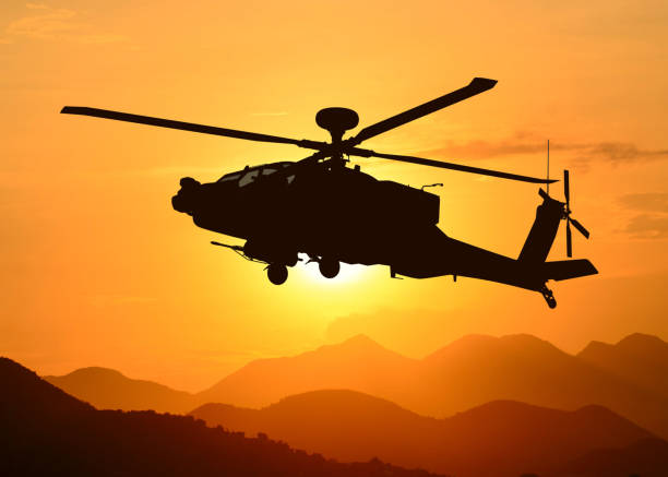 American attack helicopter in flight stock photo