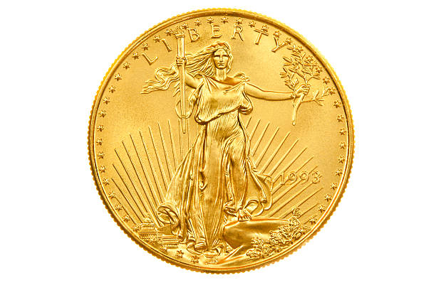 American Eagle Gold Coin Bullion Investment Obverse Official gold bullion coin of the United States of America.  22 karat gold.  Augustus Saint-Gaudens' design portrays Lady Liberty with flowing hair.  The coin is $50.00 in denomination. gold bar stock pictures, royalty-free photos & images