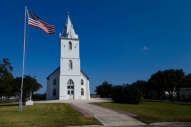American Flag and Country Catholic Church stock photo