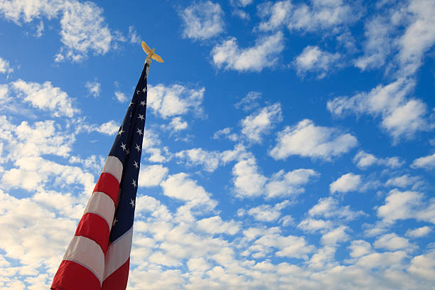 American Flag in the Clouds stock photo