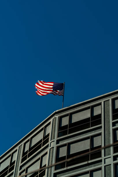 american flag on a building stock photo