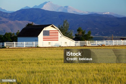 istock American Flag on Barn in Rocky Mountains 155598628