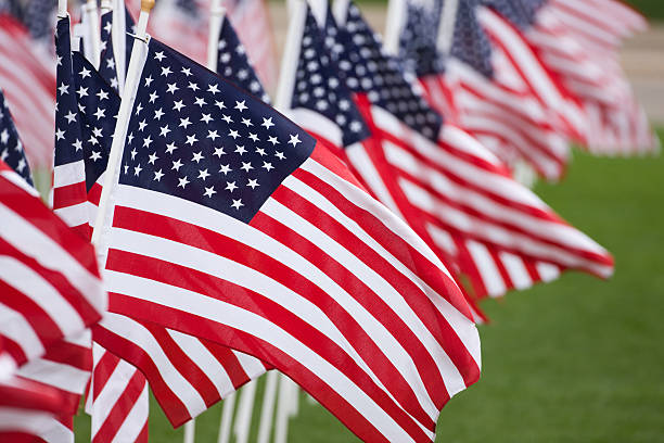 American flags fill the frame. stock photo
