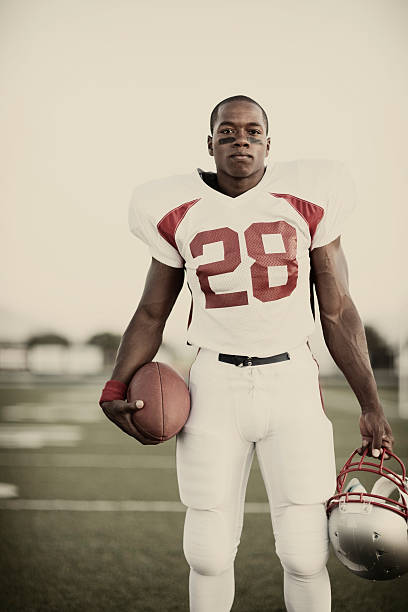 American Football Player Portrait of an African American tail back.  athlete photos stock pictures, royalty-free photos & images