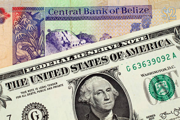 American One Dollar Bill With A Two Belize Dollar Bank Note stock photo