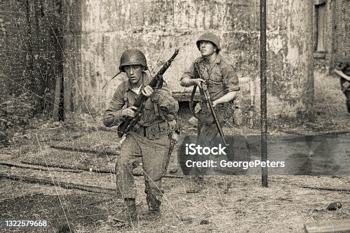 istock WWII American soldiers in combat 1322579668