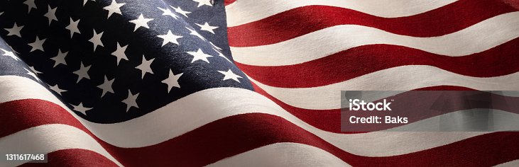 istock American Wave Flag Background. USA 1311617468